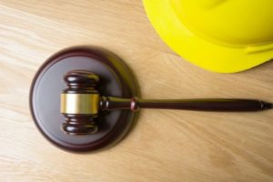 judge hammer and worker helmet