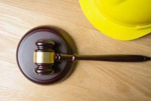 judge hammer and worker helmet